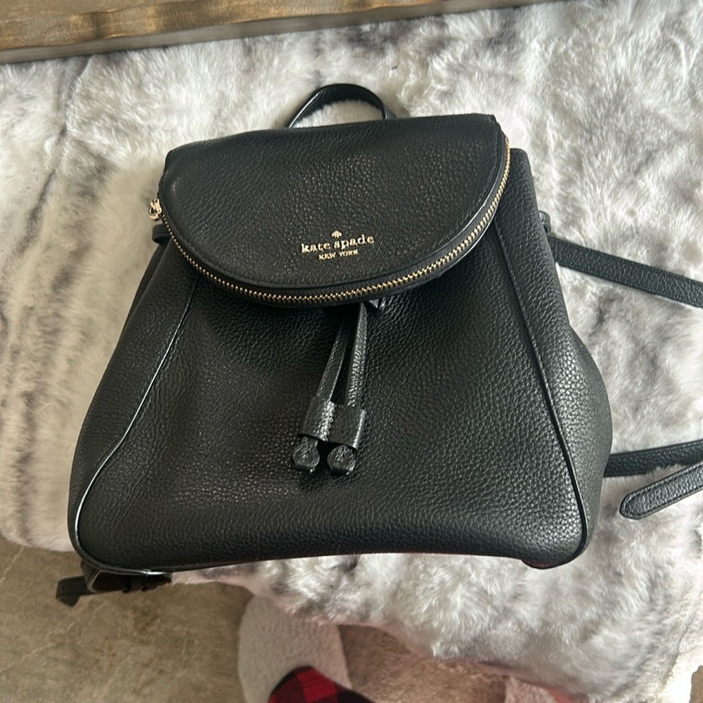 Brand new never used Kate spade back pack purse